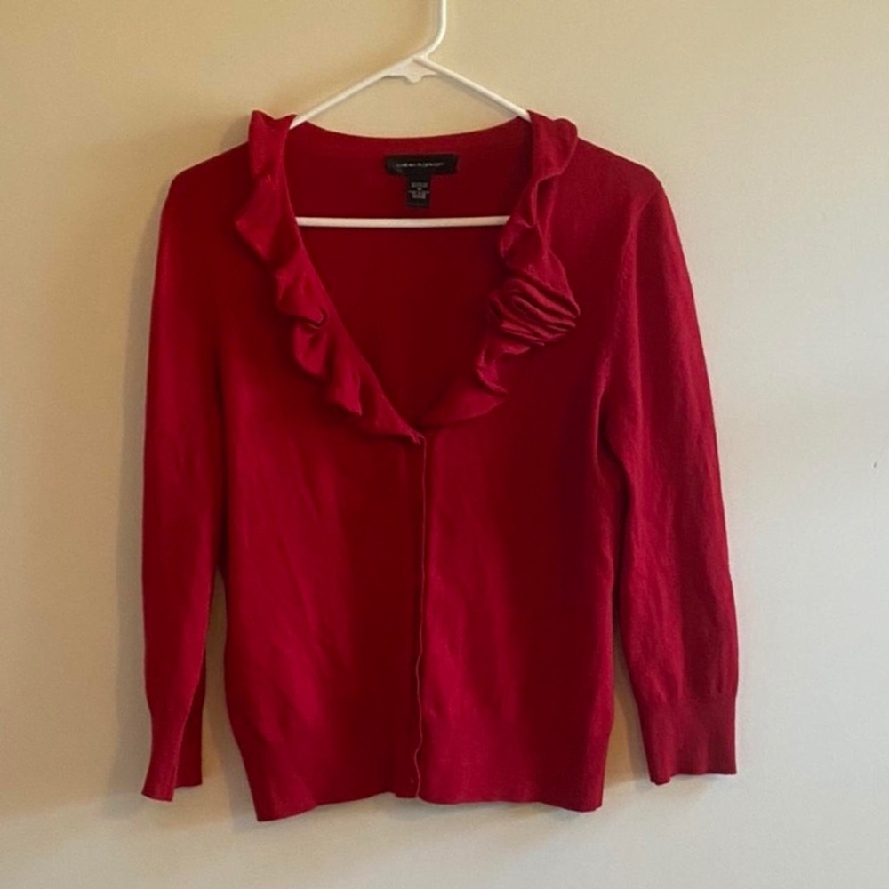 Bright red frilly knit cardigan
